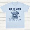 Be In Awe Of My Tism Cowboy Raccoon Shirt Light Blue S 1 1