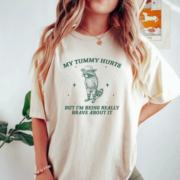 My Tummy Hurts But I’m Being Really Brave About It Bandit Raccoon Shirt