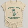 My Tummy Hurts But Im Being Really Brave About It Bandit Raccoon Shirt Natural S 1