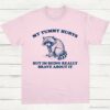 My Tummy Hurts But Im Being Really Brave About It Shy Raccoon Shirt Light Pink S 1